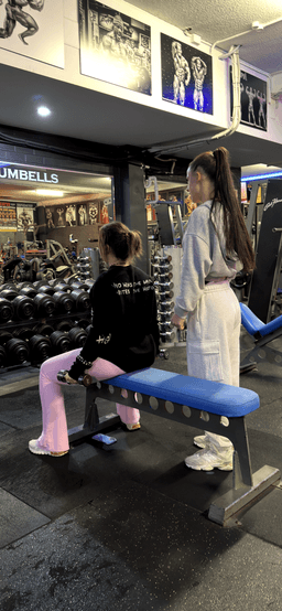 Georgia, a Defined Bodies client and mum of two, training at the gym.